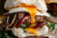 Aussie Drunken Burger Recipe: Beer-Braised Beef with Caramelized Onions