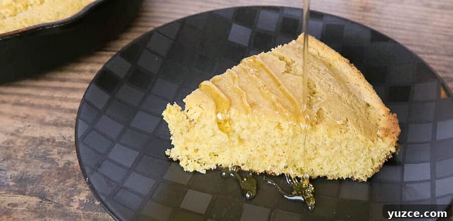 Buttery Skillet Cornbread Recipe — Moist Homemade Cornbread 7 slice of cornbread with butter