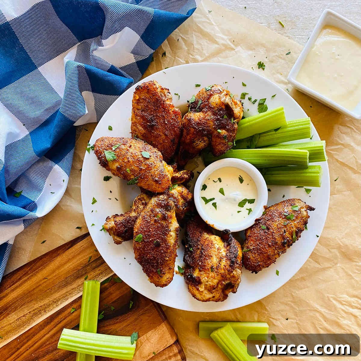 Crispy Cajun Chicken Wings Recipe: Spicy Oven-Baked Wings 7 cajun wings recipe on a plate with celery and dip
