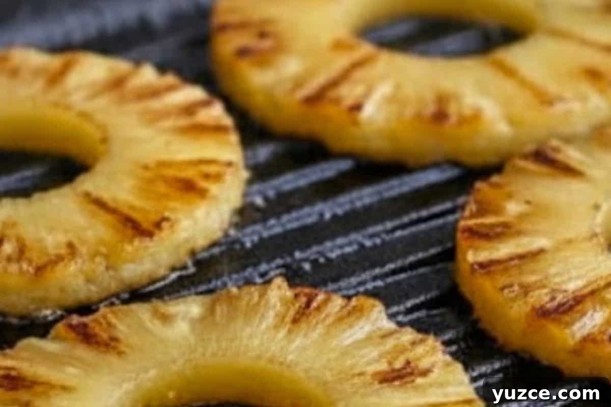 Aussie Drunken Burger Recipe: Beer-Braised Beef with Caramelized Onions 10 Once the patties are done cooking, fry the pineapple rings in the same pan for about a minute on each side, until they are caramelised and golden.
