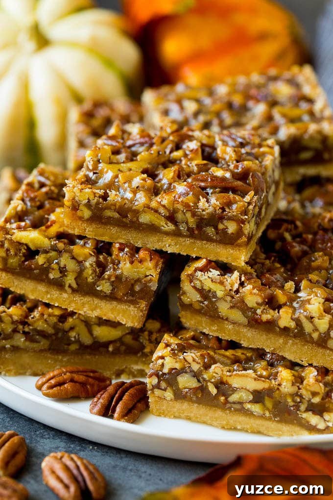 Pecan Pie Bars Recipe A serving platter full of pecan pie bars.