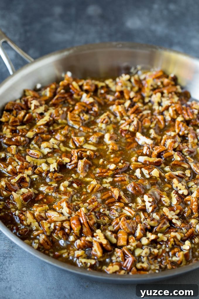 Pecan filling in pan Pecan pie filling in a pan.
