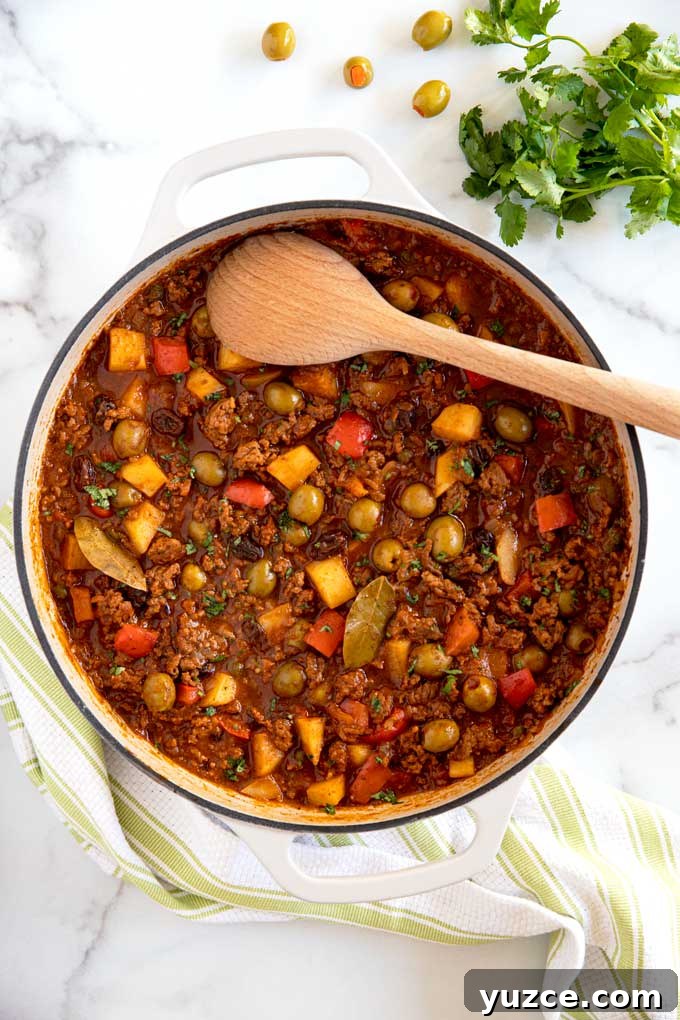 Authentic Cuban Picadillo Recipe with Sofrito and Raisins 2 Top view of a Skillet filled with Cuban Picadillo
