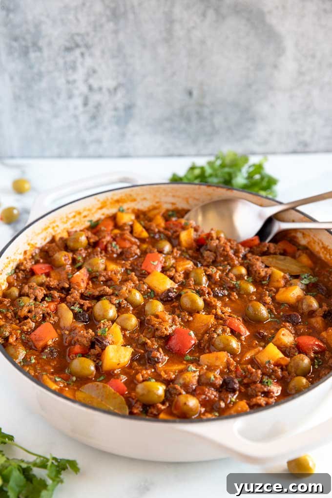 Authentic Cuban Picadillo Recipe with Sofrito and Raisins 6 Cuban ground beef dish in a skillet