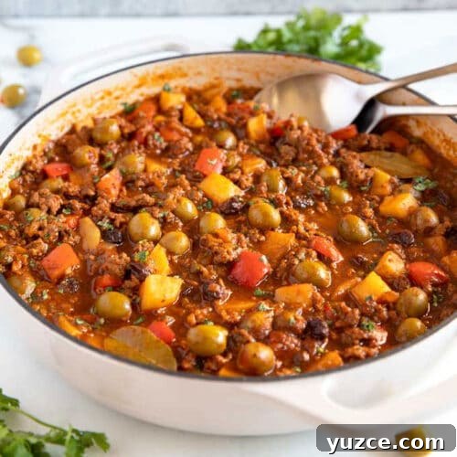 Authentic Cuban Picadillo Recipe with Sofrito and Raisins 7 A skillet filled with picadillo