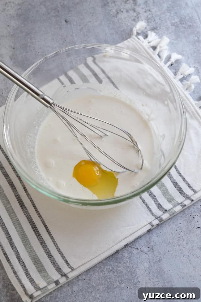 German Apfelkuchen: Classic Apple Custard Cake Recipe 14 add eggs