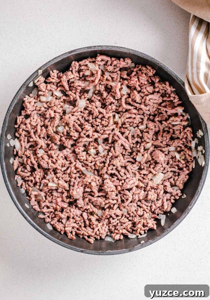 Ground Beef Lettuce Wraps with Hoisin Lime Sauce 5 Beef added to the pan of onions.
