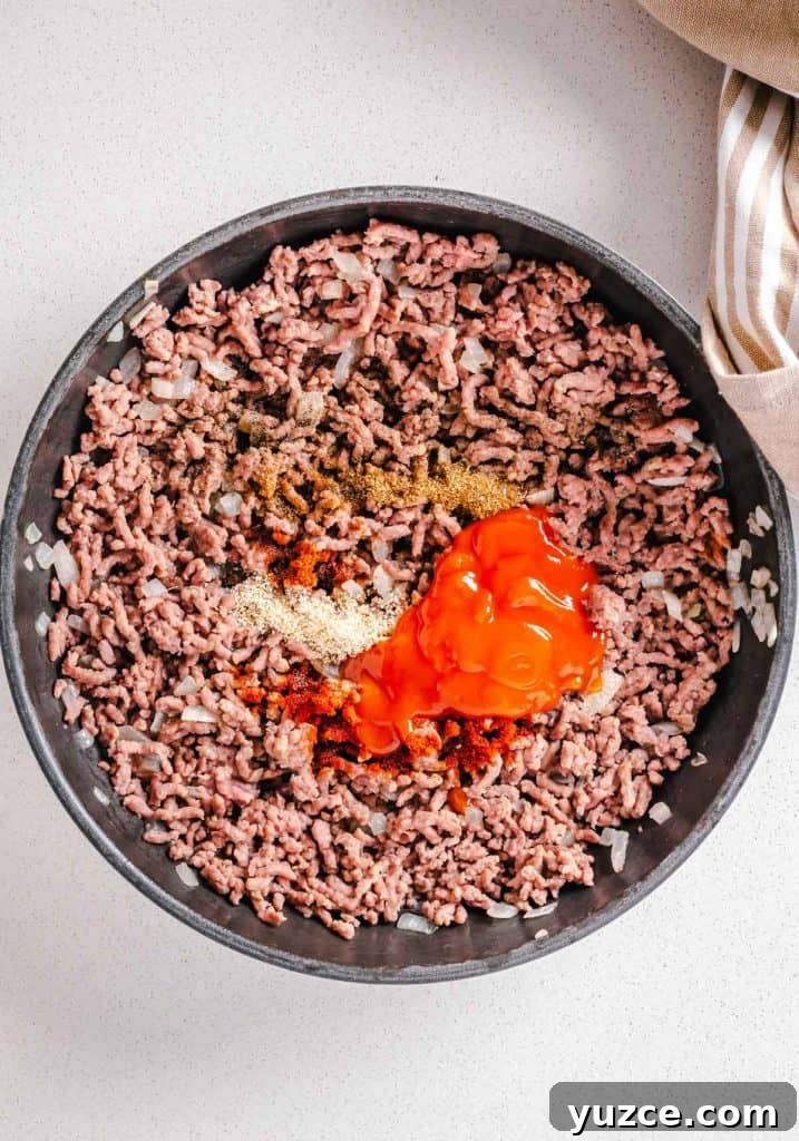 Ground Beef Lettuce Wraps with Hoisin Lime Sauce 6 Sauce and seasoning added to ground beef.