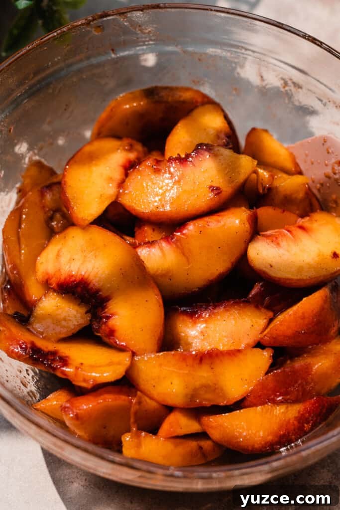 A bowl of juicy peaches.