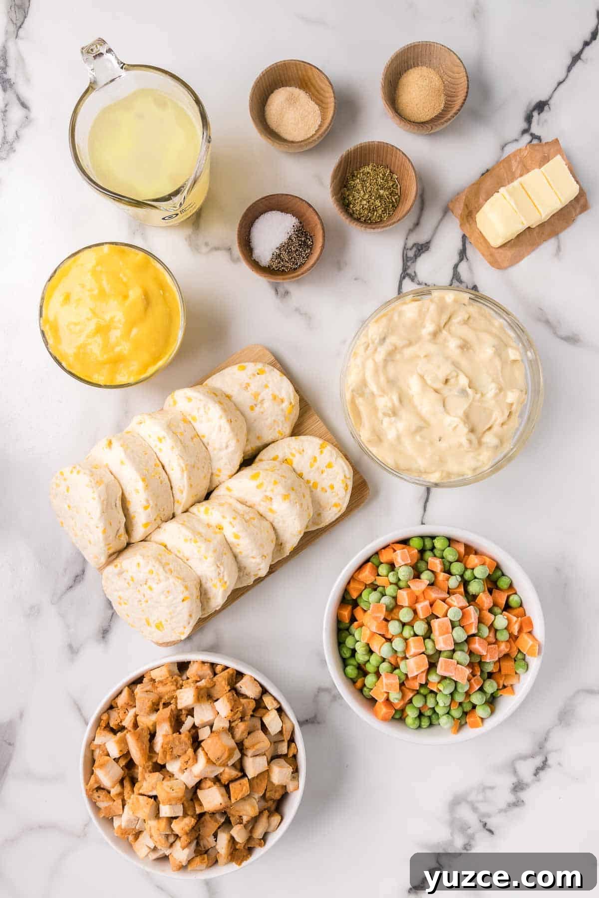 Chicken Pot Pie Casserole Topped with Golden Biscuits 3 Easy chicken pot pie casserole ingredients