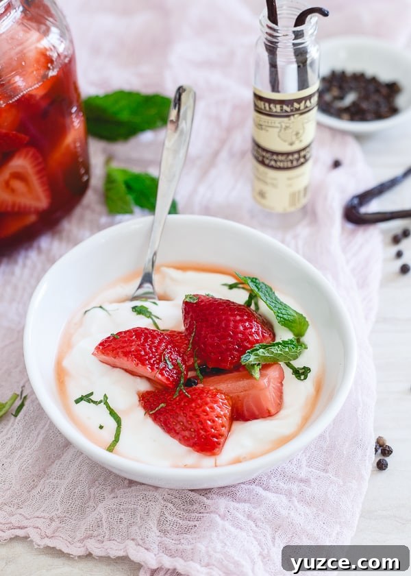Vanilla Bean Pickled Strawberries: Sweet-Tart Preserved Berries 3 Pickled strawberries served over yogurt.