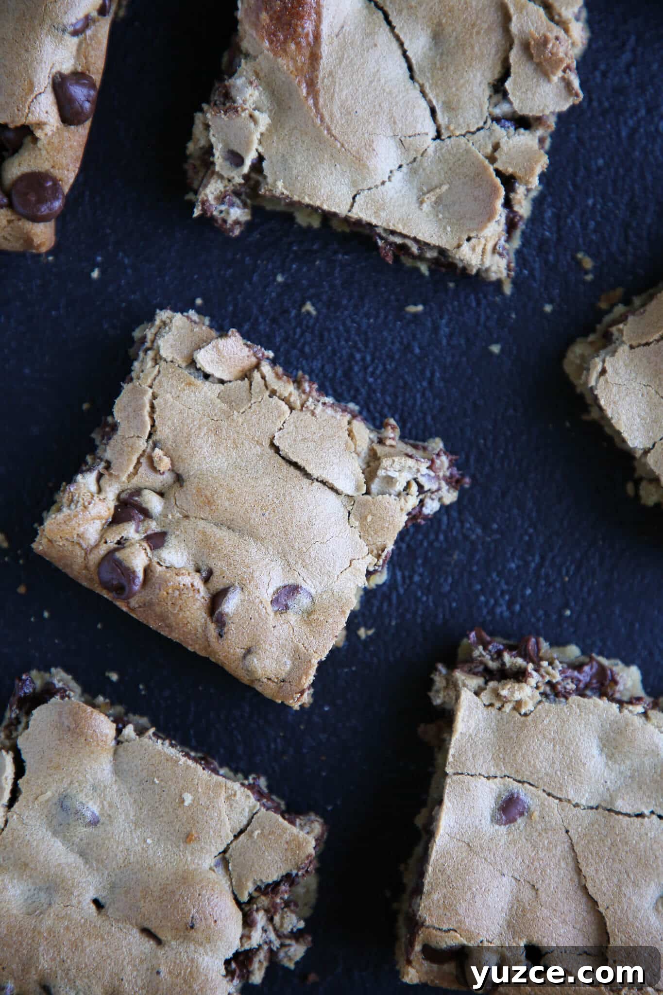 Chocolate Halfway Bars Recipe: Layered No-Bake Chocolate Treats 4 Chocolate Halfway Bars sliced on black surface