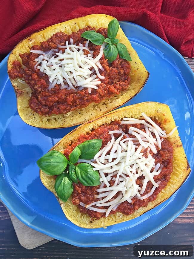 Cheesy Stuffed Spaghetti Squash Recipe with Italian Sausage 18 squash stuffed with meat sauce