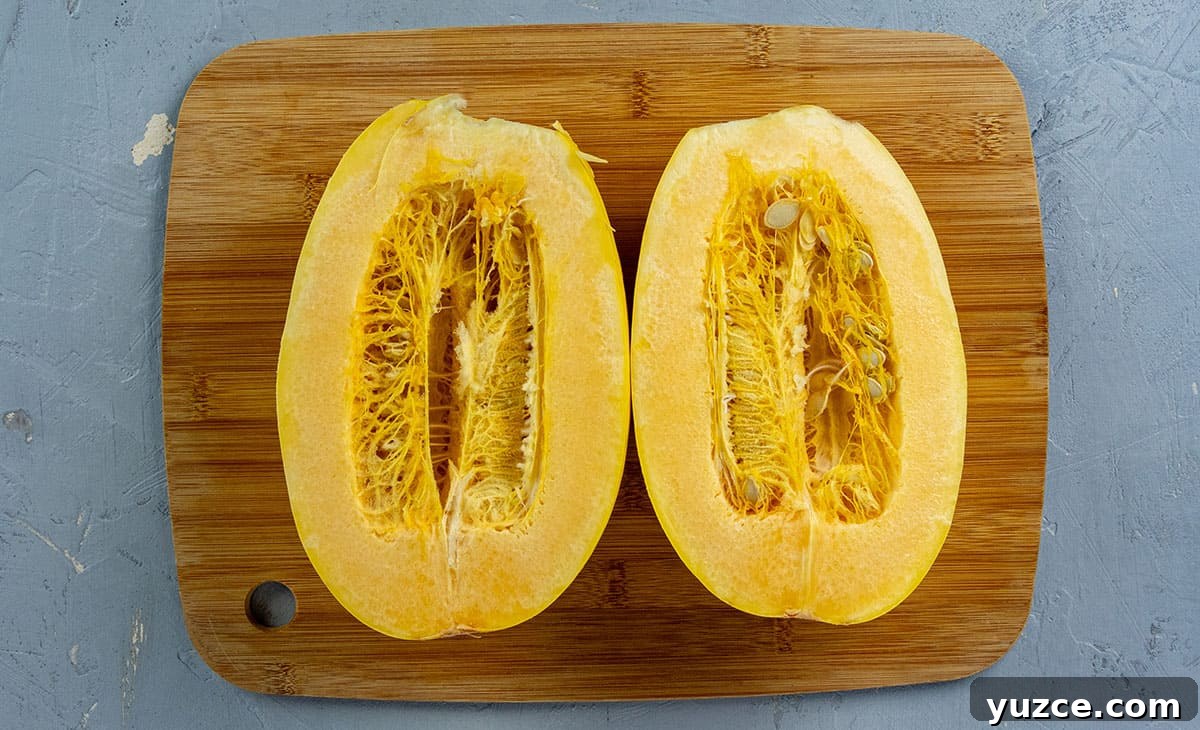 Cheesy Stuffed Spaghetti Squash Recipe with Italian Sausage 6 Spaghetti squash cut in half lenghwise.