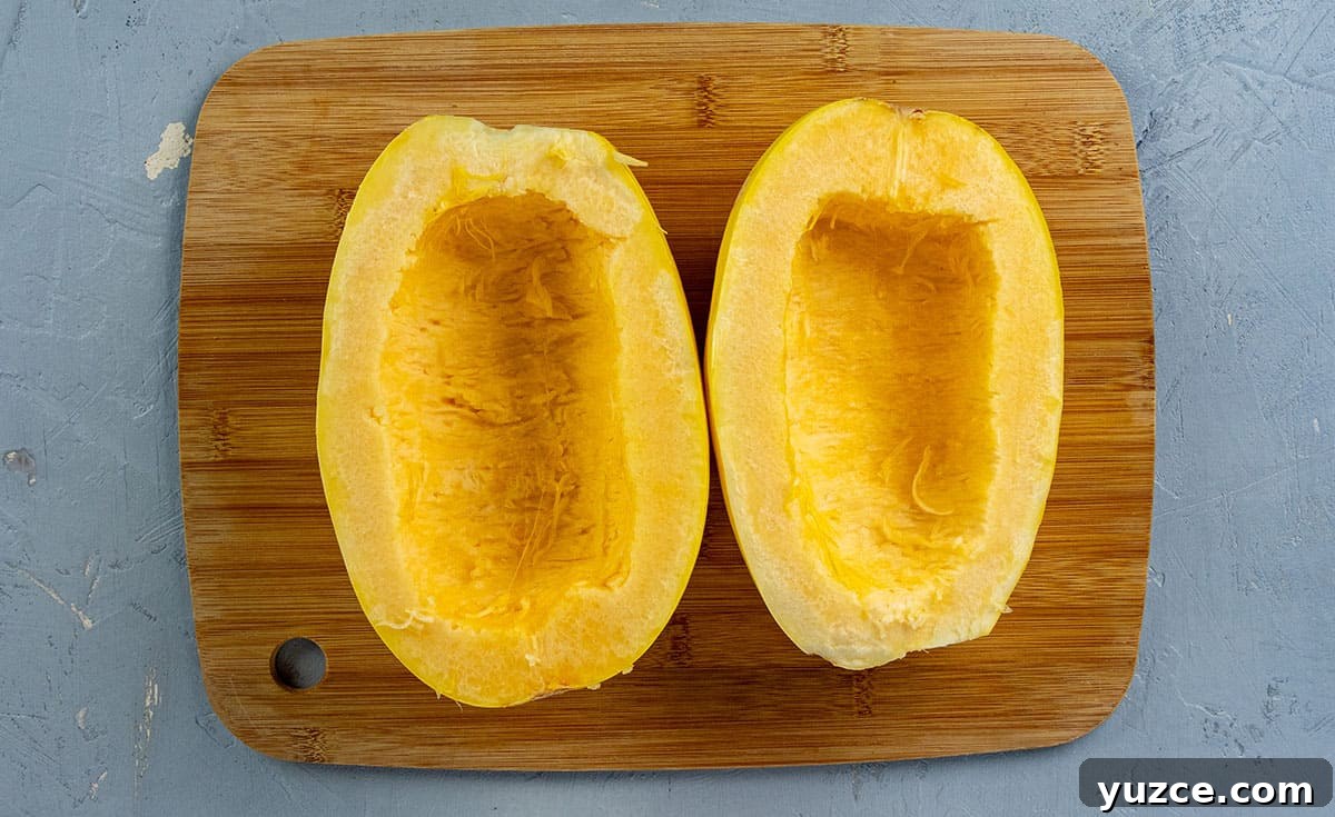 Cheesy Stuffed Spaghetti Squash Recipe with Italian Sausage 7 Seeds removed from both halves of squash.