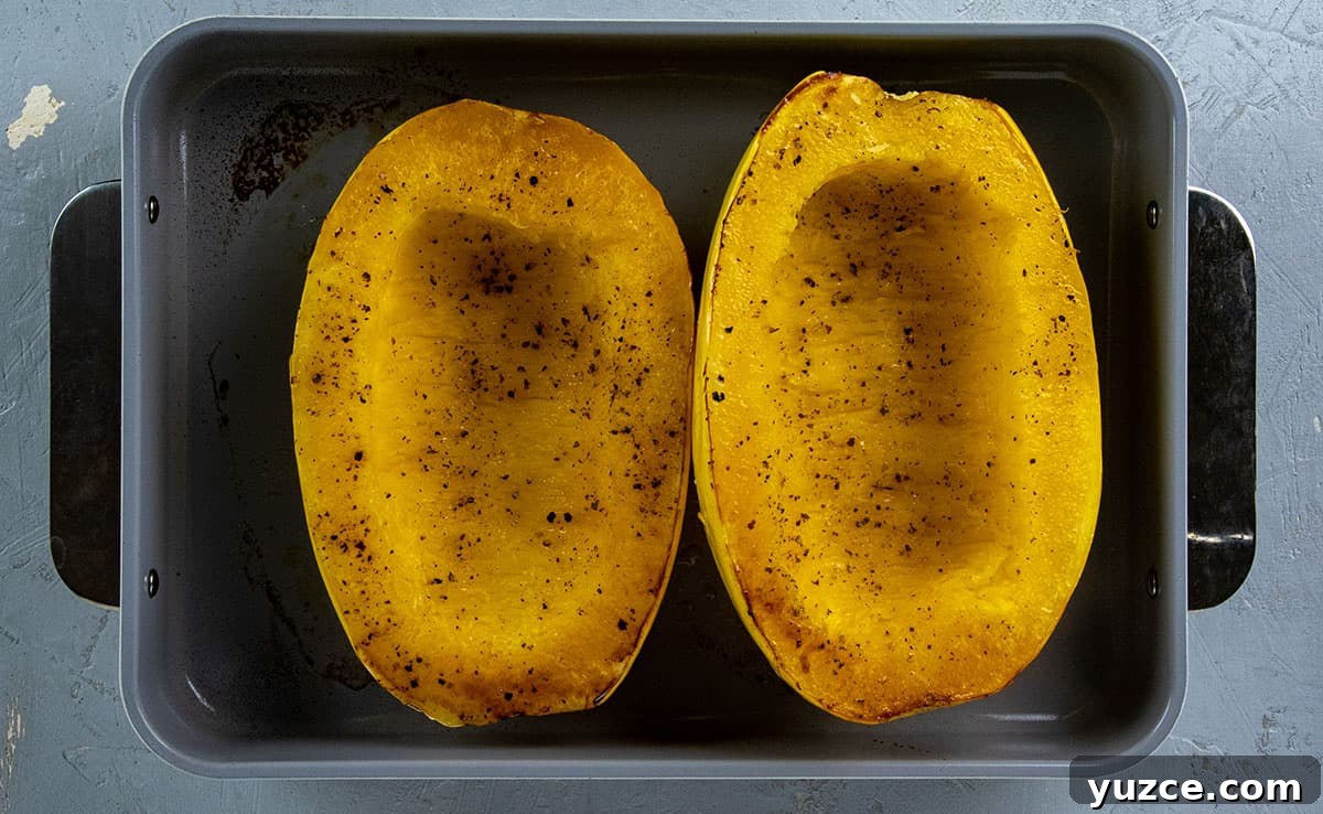 Cheesy Stuffed Spaghetti Squash Recipe with Italian Sausage 9 Roasted spaghetti squash halves.