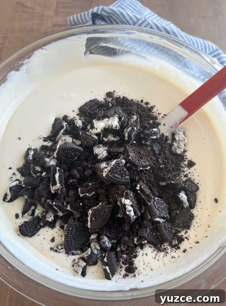 3-Ingredient Oreo Ice Cream Recipe You Can Make Tonight 6 crushed oreos in milk mixture