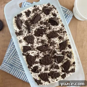 3-Ingredient Oreo Ice Cream Recipe You Can Make Tonight 9 3 ingredient oreo ice cream with oreo cookies on top in bread pan
