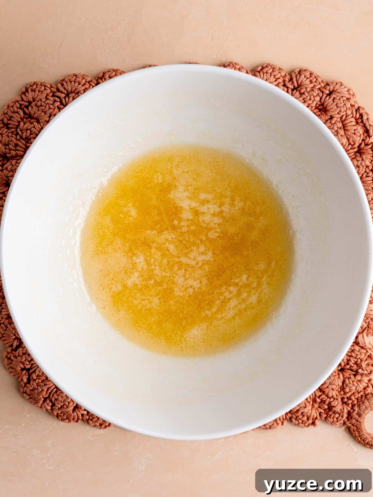 4-Ingredient Lace Cookies Recipe: Crispy Thin Cookie Delight 4 Butter and honey melted together in a bowl.