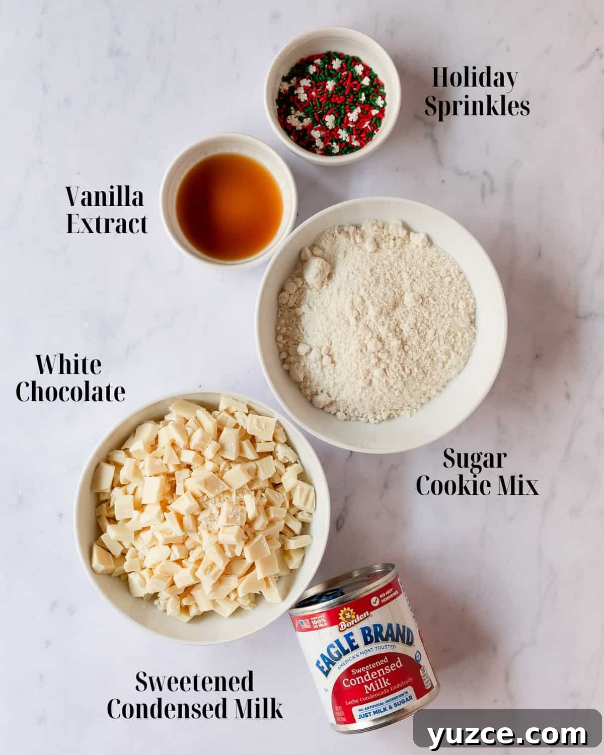Christmas Cookie Fudge Recipe — Decadent Holiday Treat 3 Ingredients for sugar cookie fudge: sugar cookie mix, sweetened condensed milk, white chocolate, vanilla, and sprinkles