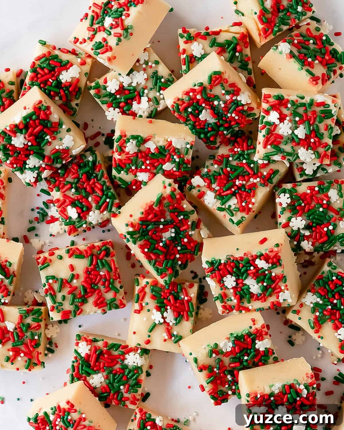 Christmas Cookie Fudge Recipe — Decadent Holiday Treat 6 Sliced sugar cookie fudge with sprinkles
