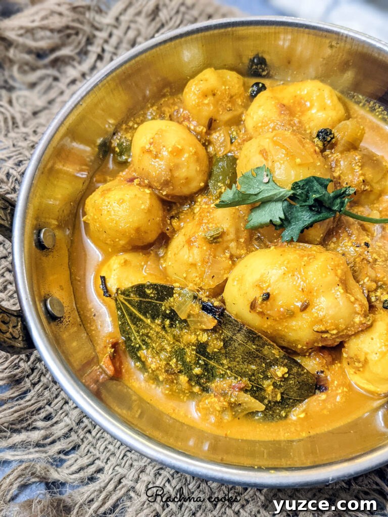 Authentic Dum Aloo Recipe: Kashmir-Style Potato Curry Guide 9 Tasty dum aloo in a close up shot.