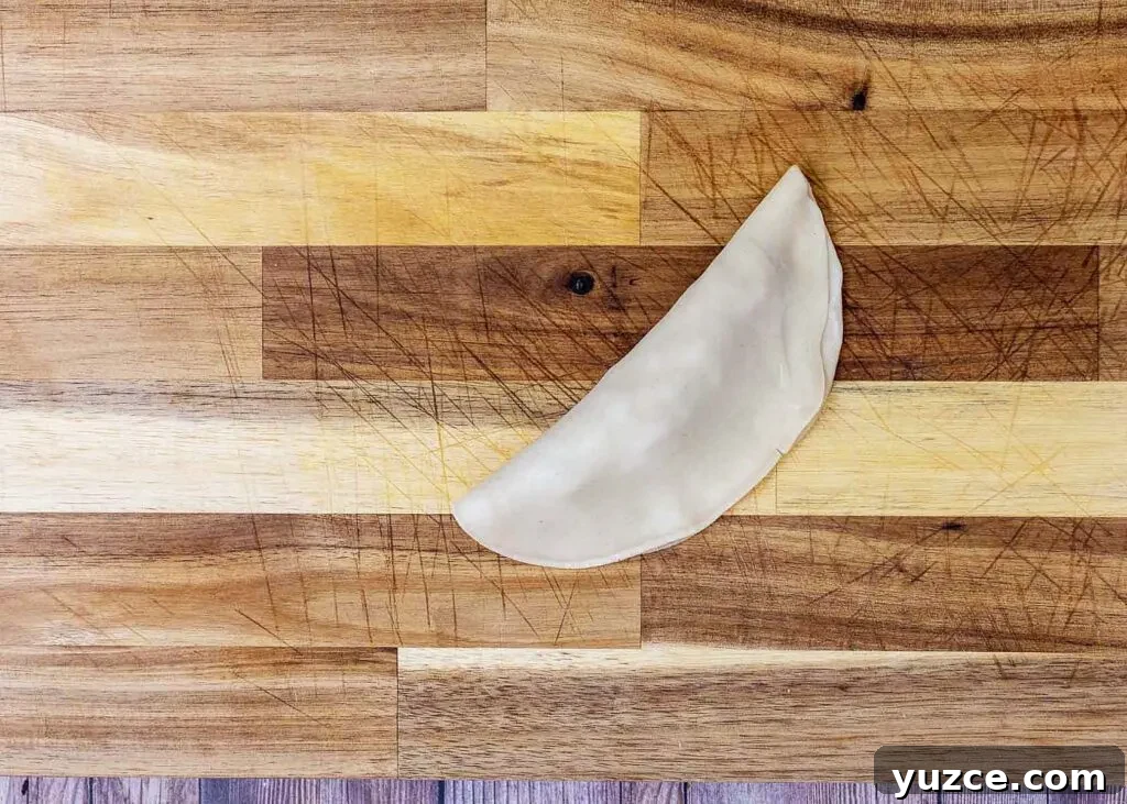 Air-Fried Apple Empanadas Recipe: Crispy Homemade Dessert 5 Fold in half