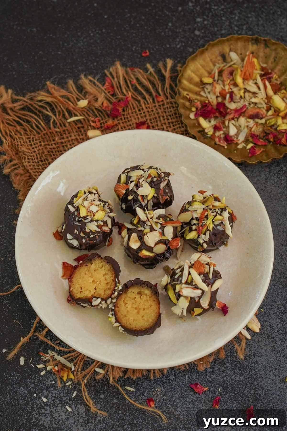 Gulabjamun truffles served on a plate.