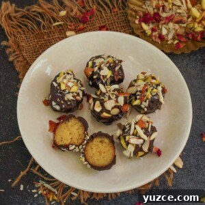 These Gulab Jamun Truffles is a super easy-to-make Indian fusion dessert where juicy Gulab jamuns are coated with dark chocolate. Make it this festive season and impress your guests.
