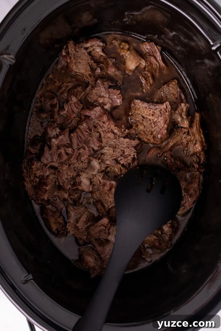 Slow-Cooker French Dip Sandwiches with Savory Au Jus 6 beef roast in slow cooker.