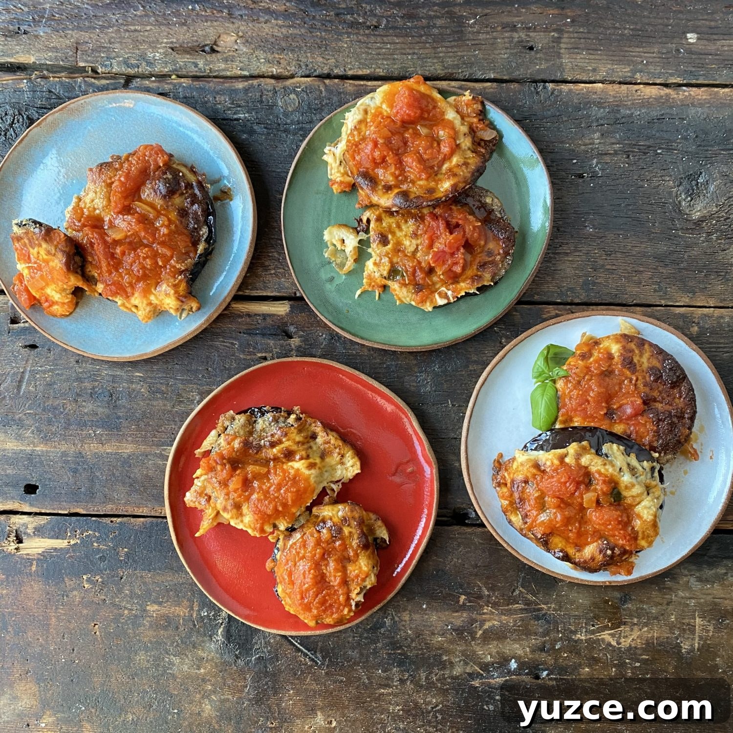 Gluten-Free Eggplant Parmesan: Crispy Baked Recipe for Flavorful Dinner 3 eggplant parmesan on molly plates