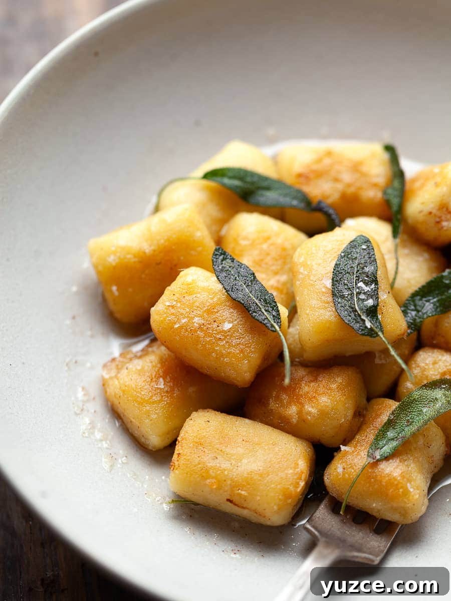 Homemade Gluten-Free Gnocchi Recipe for Tender Pillowy Dumplings 2 a bowl of homemade gluten free potato gnocchi with brown butter and sage
