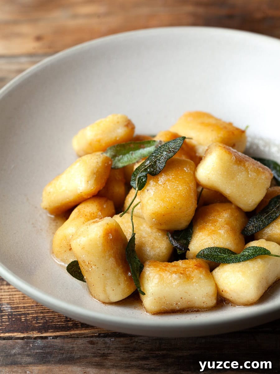 Homemade Gluten-Free Gnocchi Recipe for Tender Pillowy Dumplings 11 a bowl of homemade gluten free potato gnocchi with brown butter and sage