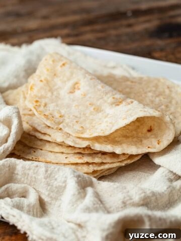 Make taco night special with this easy small batch gluten-free flour tortilla recipe! Soft, pliable, and perfect for wraps or quesadillas!