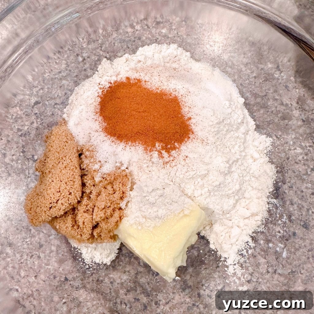 Pumpkin Streusel Muffins with Cinnamon Crumble 4 Streusel ingredients in a bowl.