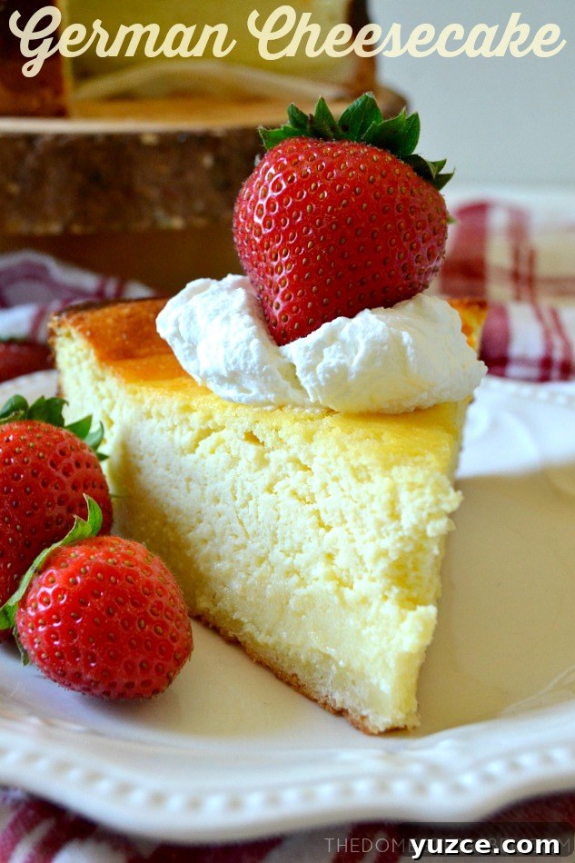 german cheesecake slice on white plate with strawberries