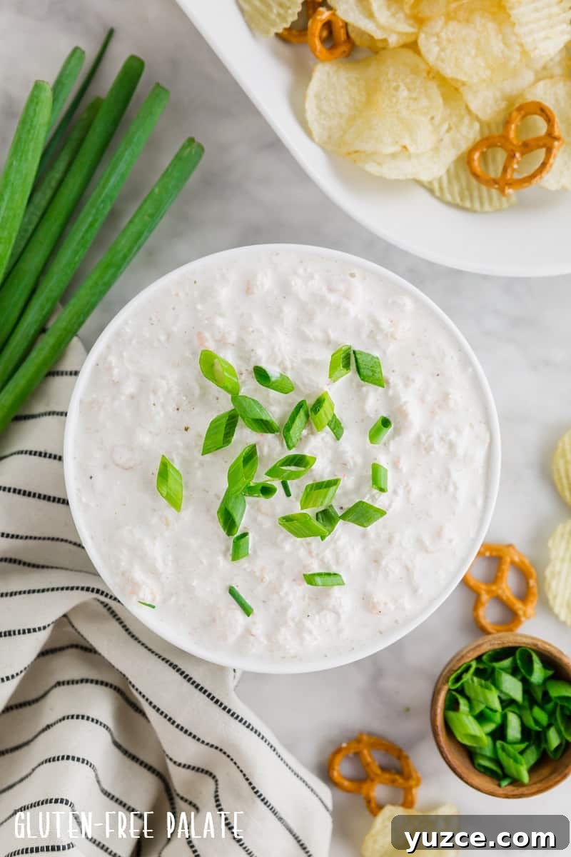 17 Delicious Gluten-Free Shrimp Recipes for Every Meal 4 top down photo of gluten-free seafood dip topped with sliced green onions