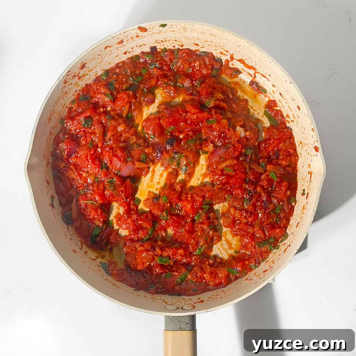 Spaghetti all’Arrabbiata Recipe: Spicy Tomato Pasta Guide 8 Completed arrabiata sauce in a large frying pan.