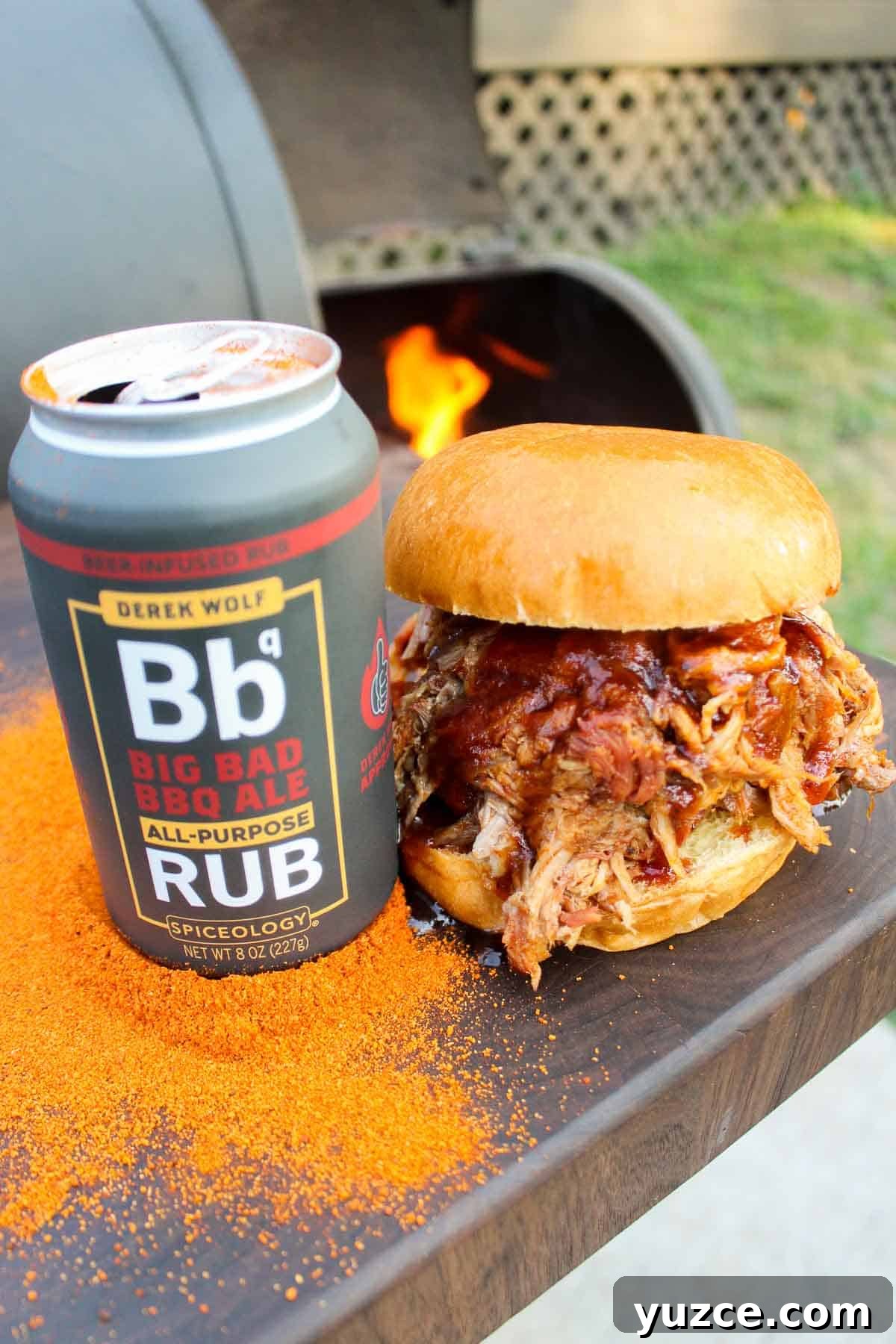 Smoky Pulled Pork BBQ Sandwich Recipe for Juicy Flavor 2 Big Bad BBQ Ale rub next to the Pulled Pork BBQ Sandwiches.
