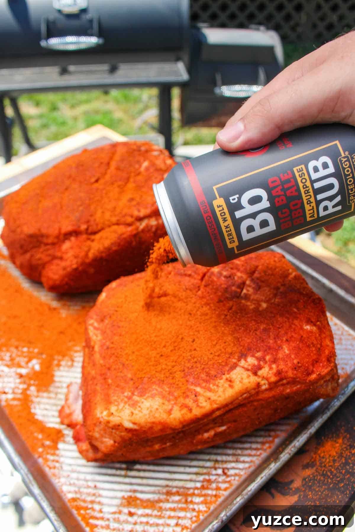 Smoky Pulled Pork BBQ Sandwich Recipe for Juicy Flavor 4 Adding some bbq seasoning to the meat.