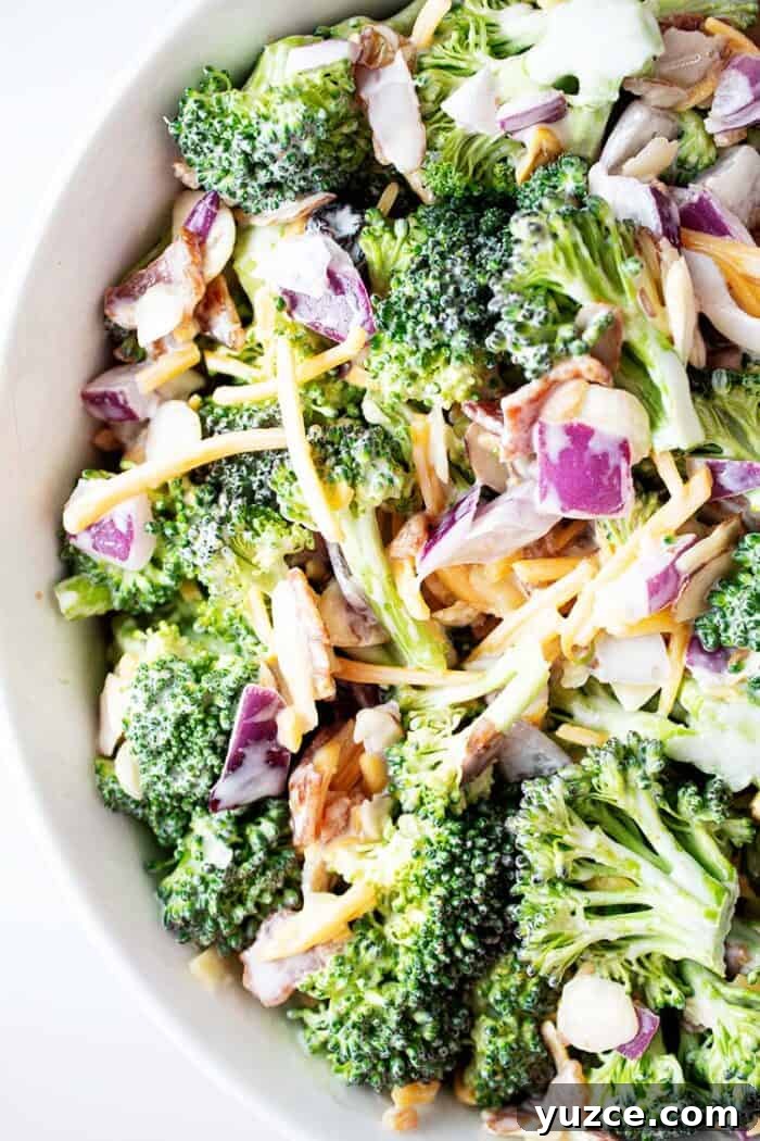 overhead view of keto broccoli salad in a white serving bowl