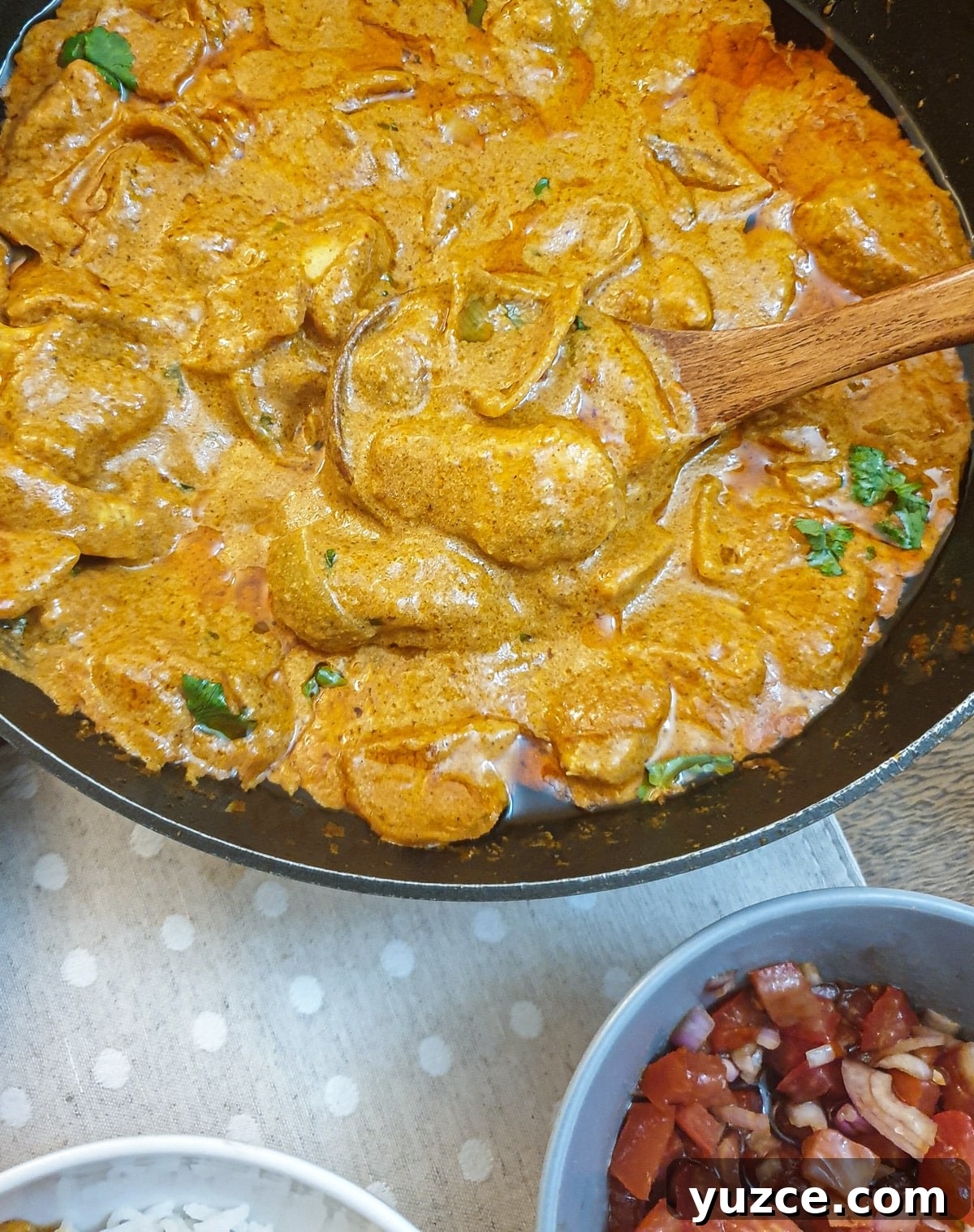 Creamy Murgh Makhani (Authentic Butter Chicken Recipe) 3 Close up of a dish of butter chicken.