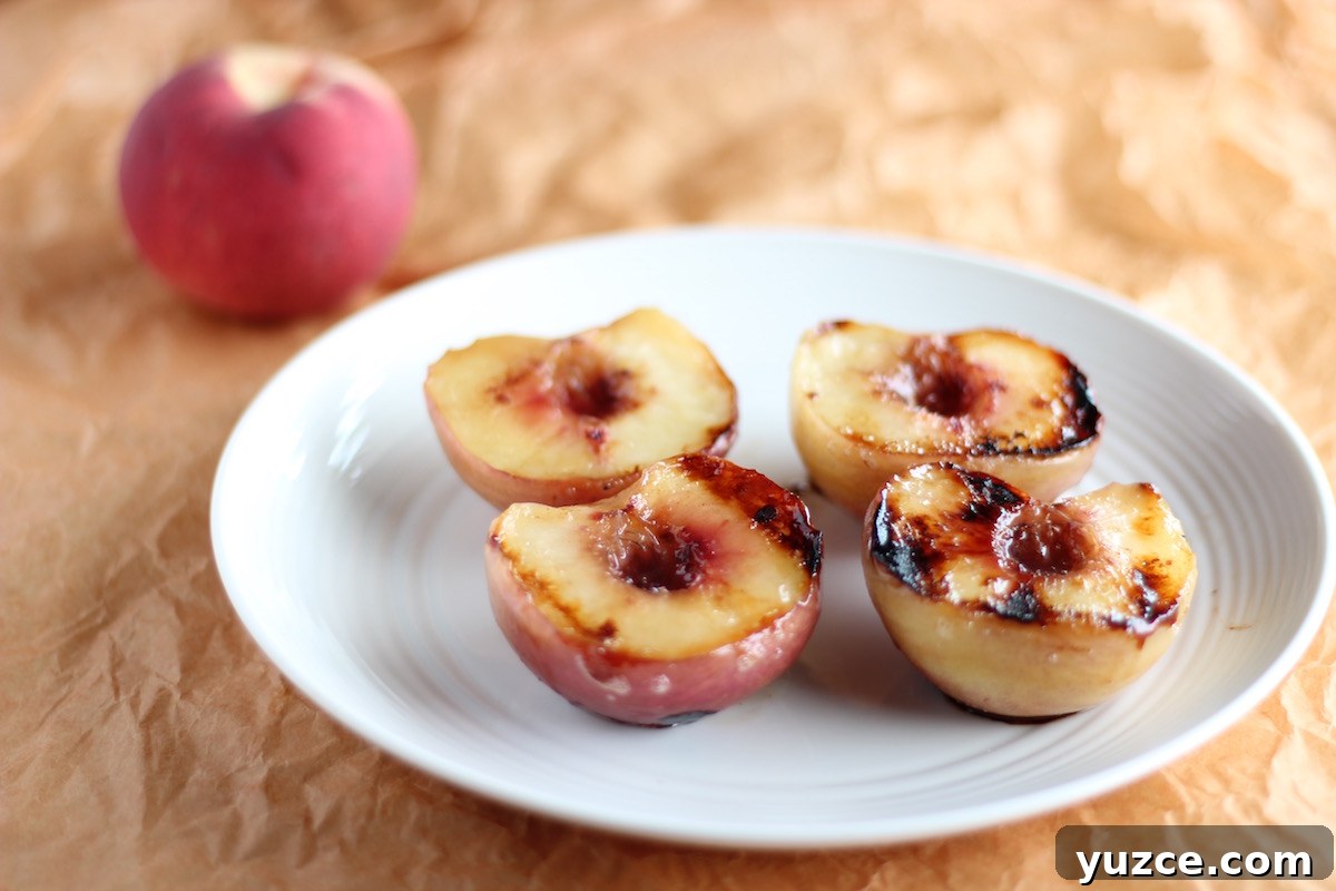 Grilled Peaches with Cinnamon Ice Cream (AIP-Friendly) 7 Grilled Peaches with Cinnamon Spice Ice Cream - a super easy dessert that is full of flavor from fresh peaches, cinnamon, spices, and honey!