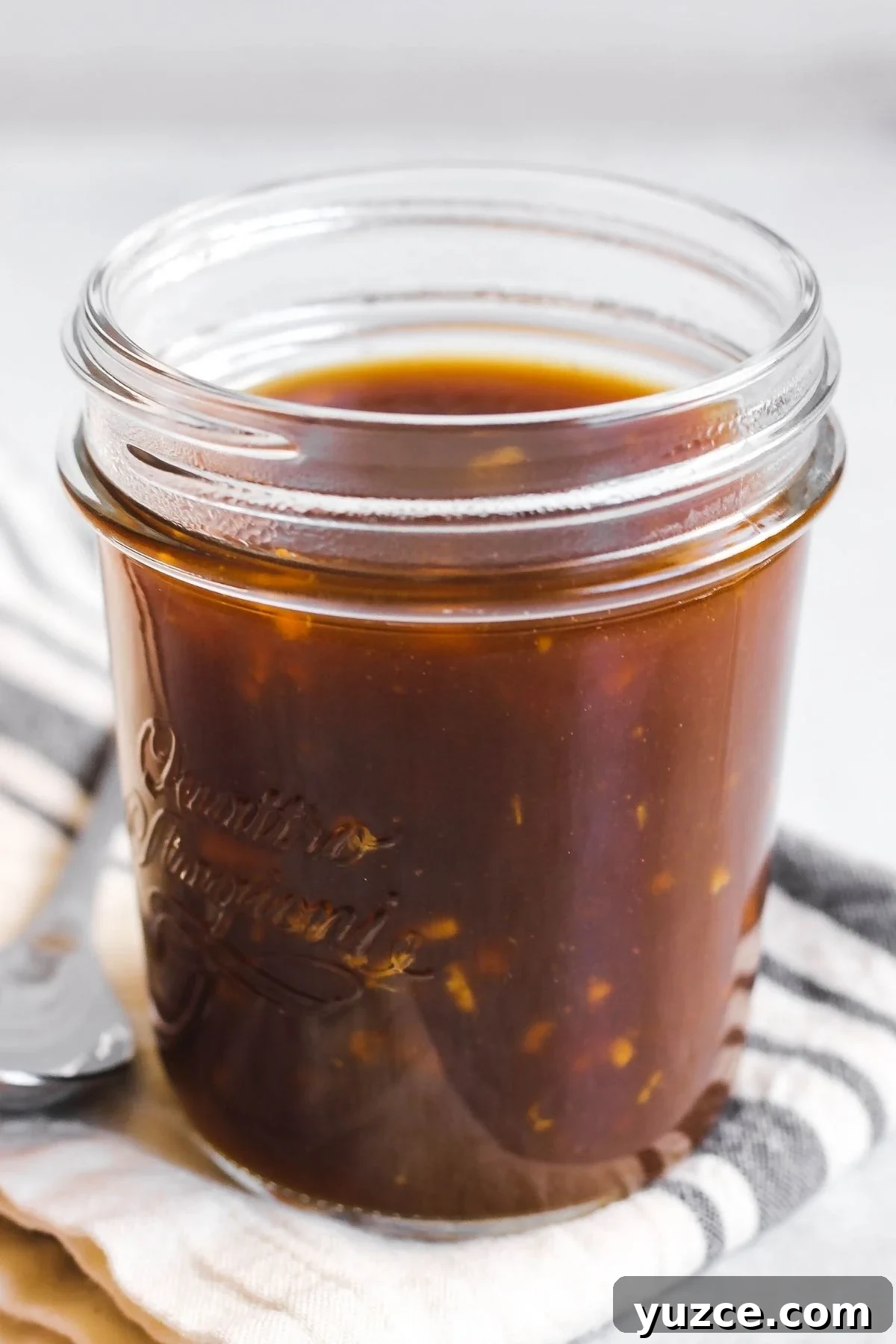 Soy-Free Teriyaki Sauce with Coconut Aminos — Quick Recipe 6 Mason jar filled with soy-free teriyaki sauce.