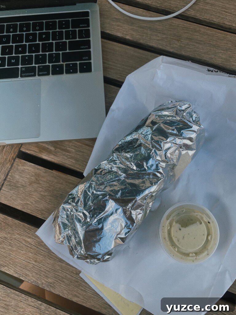 Skier’s Breakfast Burrito — Beaumont Bakery Breakfast Sandwich 2 breakfast burrito in tinfoil