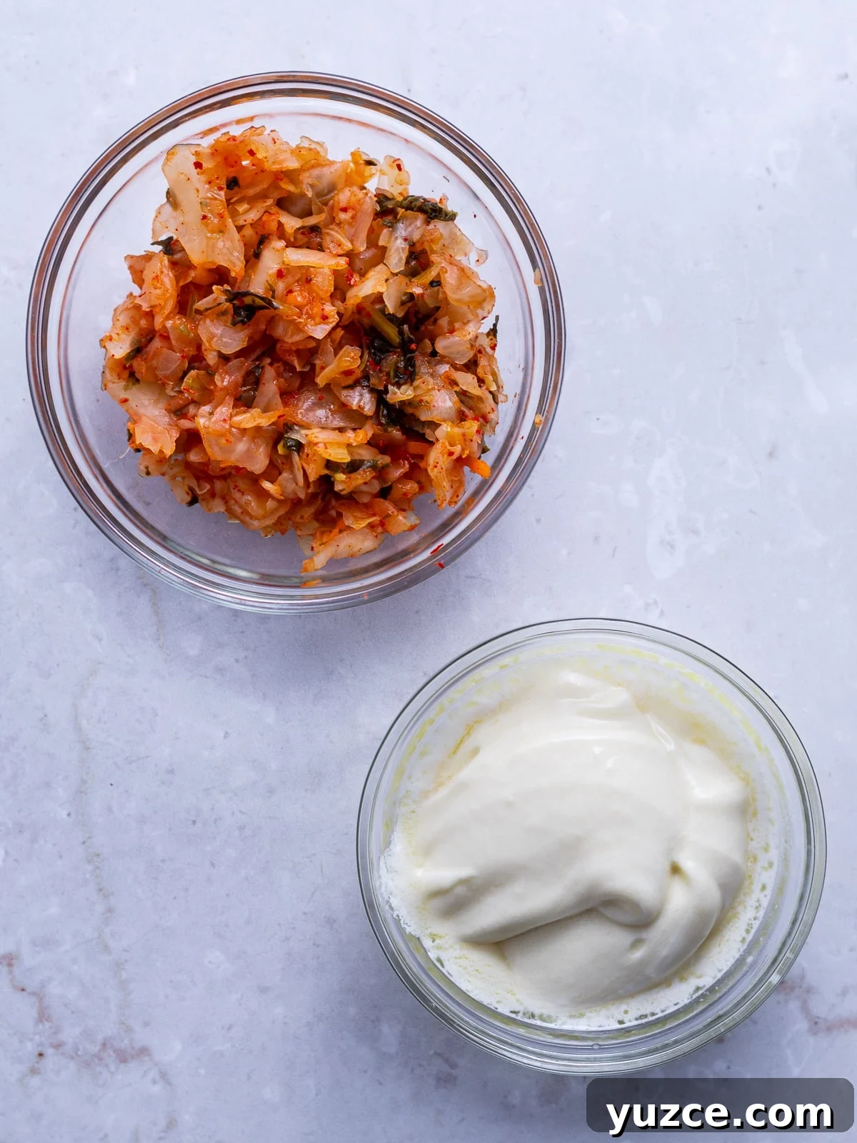 Spicy Kimchi Mayo Recipe for sandwiches, dips, and more 3 what you need to make the recipe: bowl of kimchi and bowl of mayo