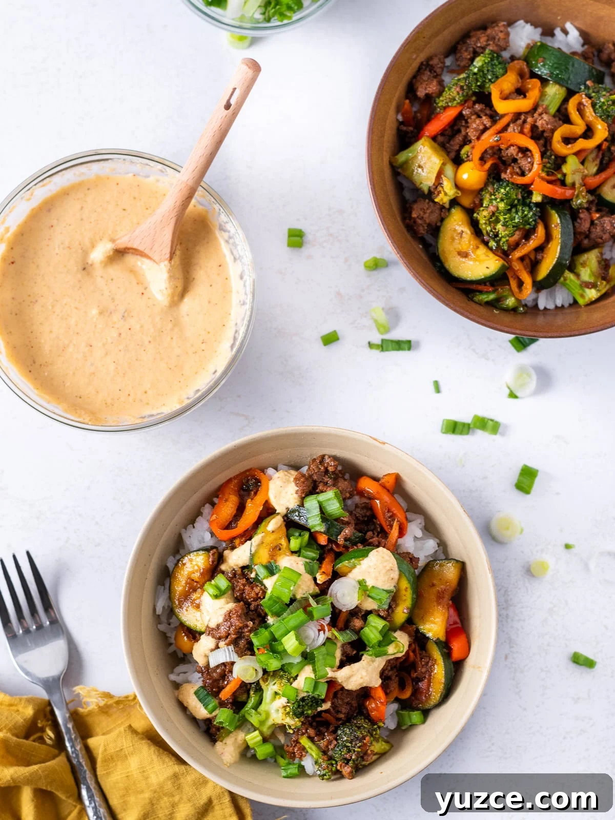 Spicy Kimchi Mayo Recipe for sandwiches, dips, and more 6 teriyaki beef bowls drizzled with kimchi mayo