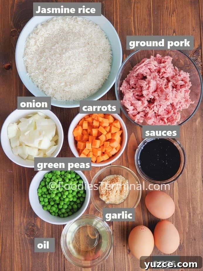 Authentic Chinese Pork Fried Rice Recipe for Perfect Takeout Flavor 3 Recipe ingredients on a wooden board