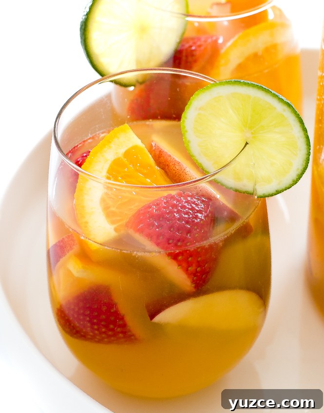 Refreshing White Wine Sangria Recipe with Fresh Fruit 3 white wine sangria in clear glasses