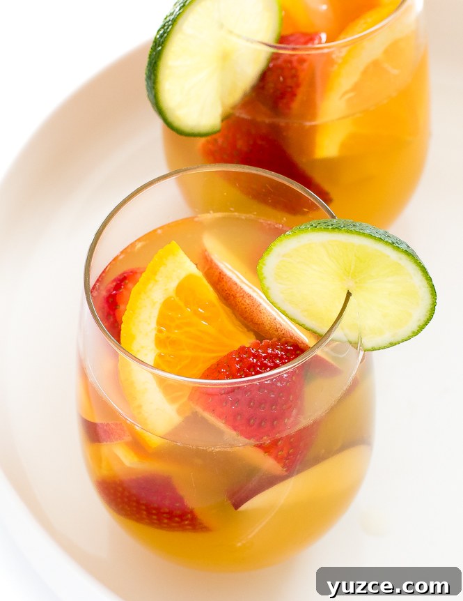 Refreshing White Wine Sangria Recipe with Fresh Fruit 5 wine with fruit in glasses